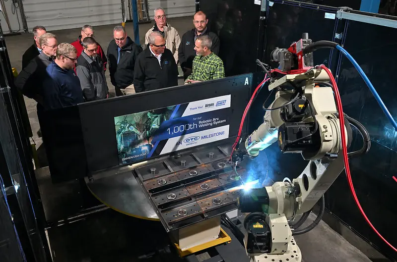 In 2022, OTC DAIHEN and distributor partner Airgas delivered the 1000th production robotic welding system — a SERVO-ARC 720B turntable robot welder – to East Manufacturing.